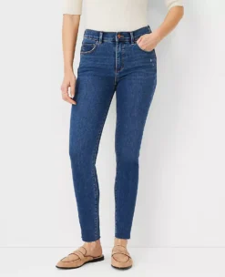 Sculpting Pocket Mid Rise Skinny Jeans In Mid Stone Wash